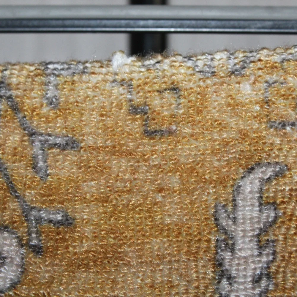 West Elm Tufted Jacquard Pillow Cover – Mustard & Gray Vintage-Inspired Pattern.